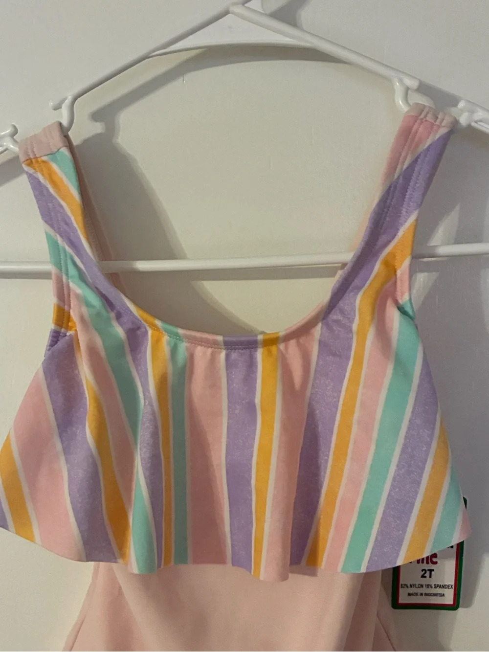 Girls Pink One-Piece Swimsuit with Colorful Striped Ruffle
